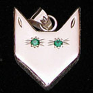Wolf Waker Logo pendant with faceted green stone eyes set into sterling silver with texture sides that resembles fur
